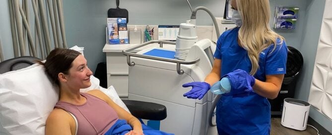 Patient receiving CoolSculpting consultation