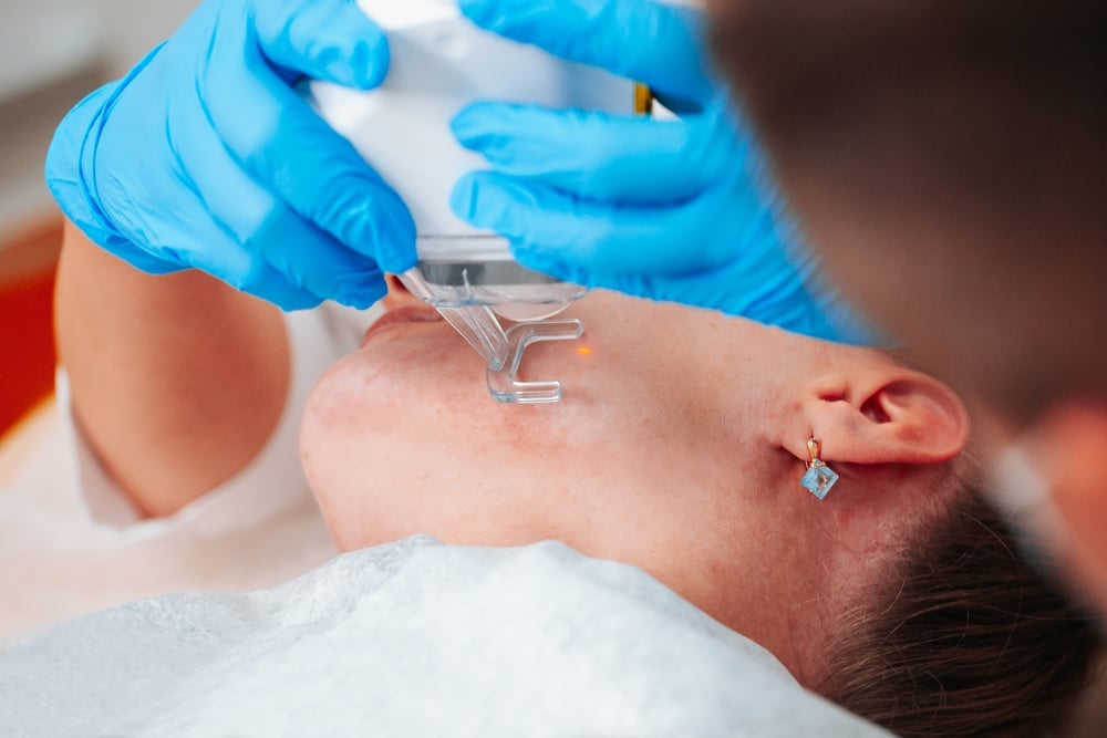 Doctor,Cosmetologist,Performs,The,Procedure,Of,Laser,Skin,Resurfacing,And Laser Resurfacing Prices in Boise, Idaho: CO2 and Erbium Treatment Costs