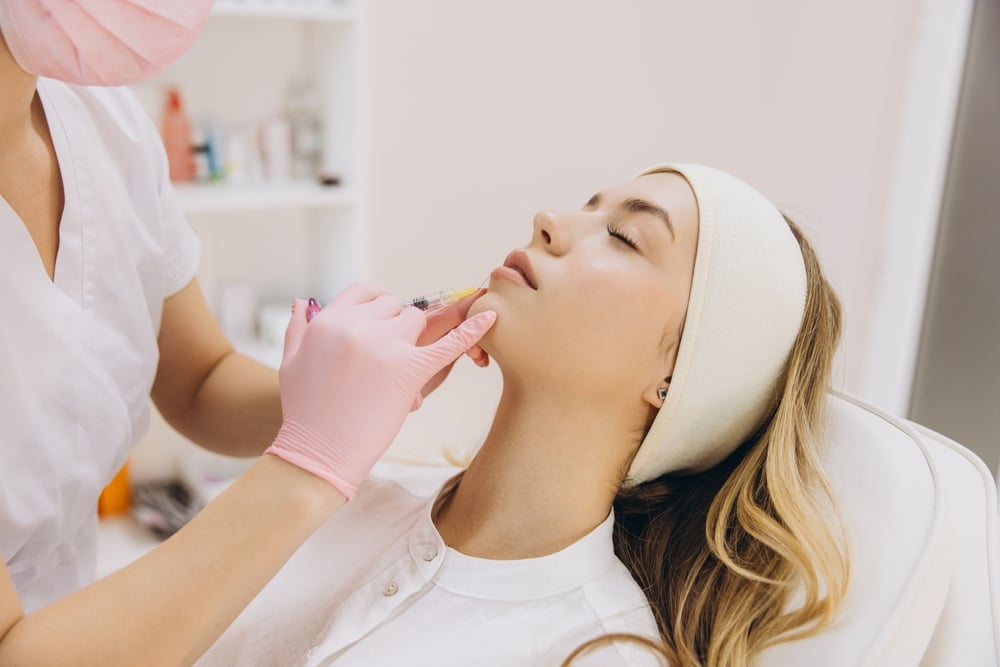 Professional,Beautician,Administering,Botox,Lip,Treatment,,Carefully,Injecting,Cosmetic,Filler Natural-Looking Lip Filler in Meridian, Idaho: Cost, Results, and Longevity